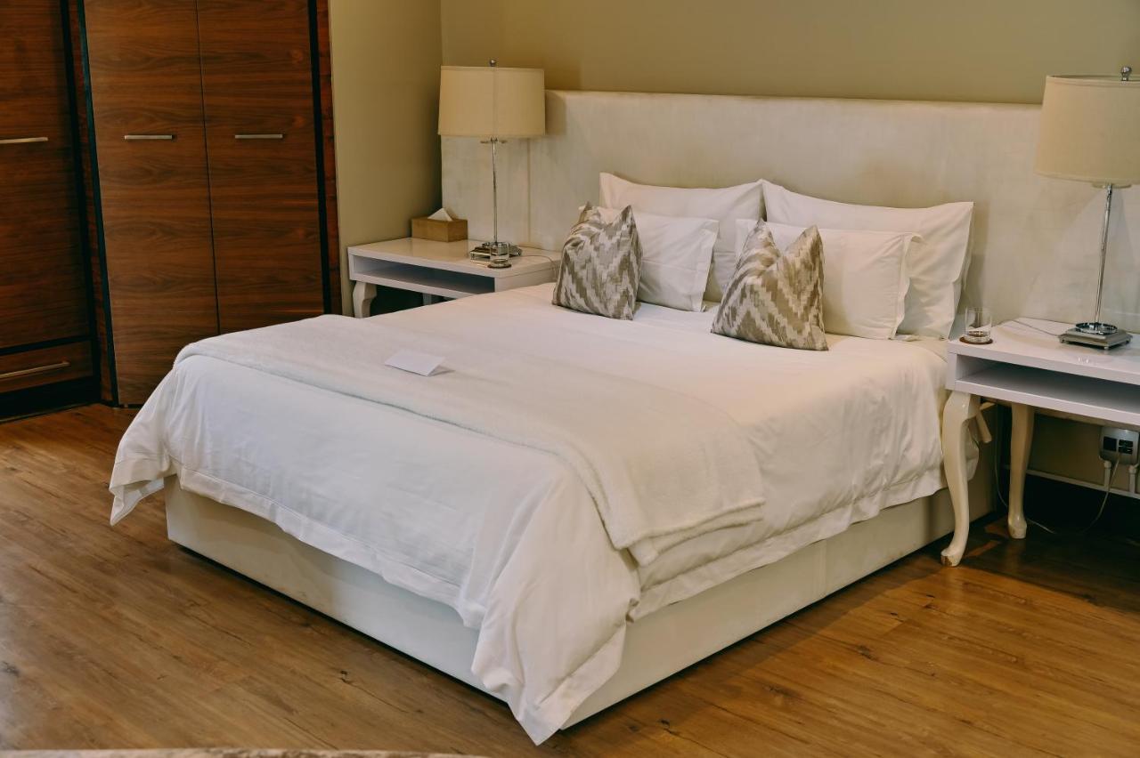 Tredenham Boutique Hotel Блумфонтейн Екстер'єр фото A bed
